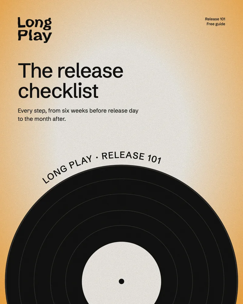 The cover of The release checklist: a black record with a white label on an amber glow.
